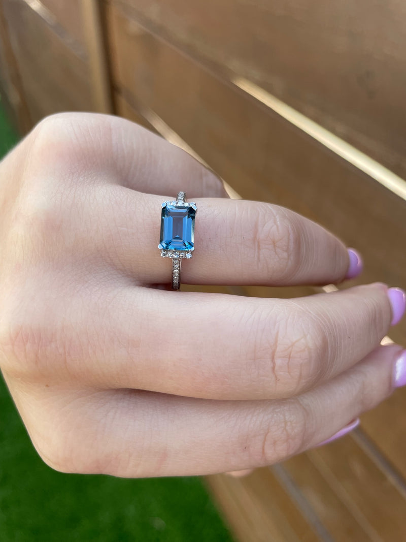 Diamond Emerald Cut East/West Blue Topaz Ring in 14K White Gold